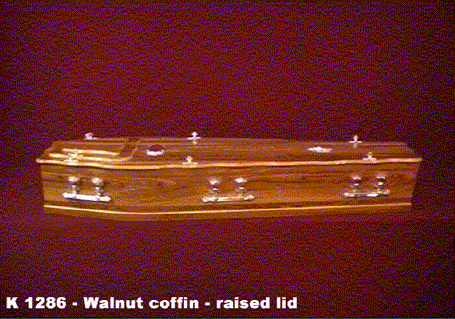 Walnut coffin - raised lid